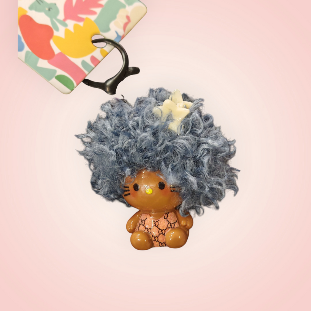 Hello kitty coupe fluffy porte clés au choix