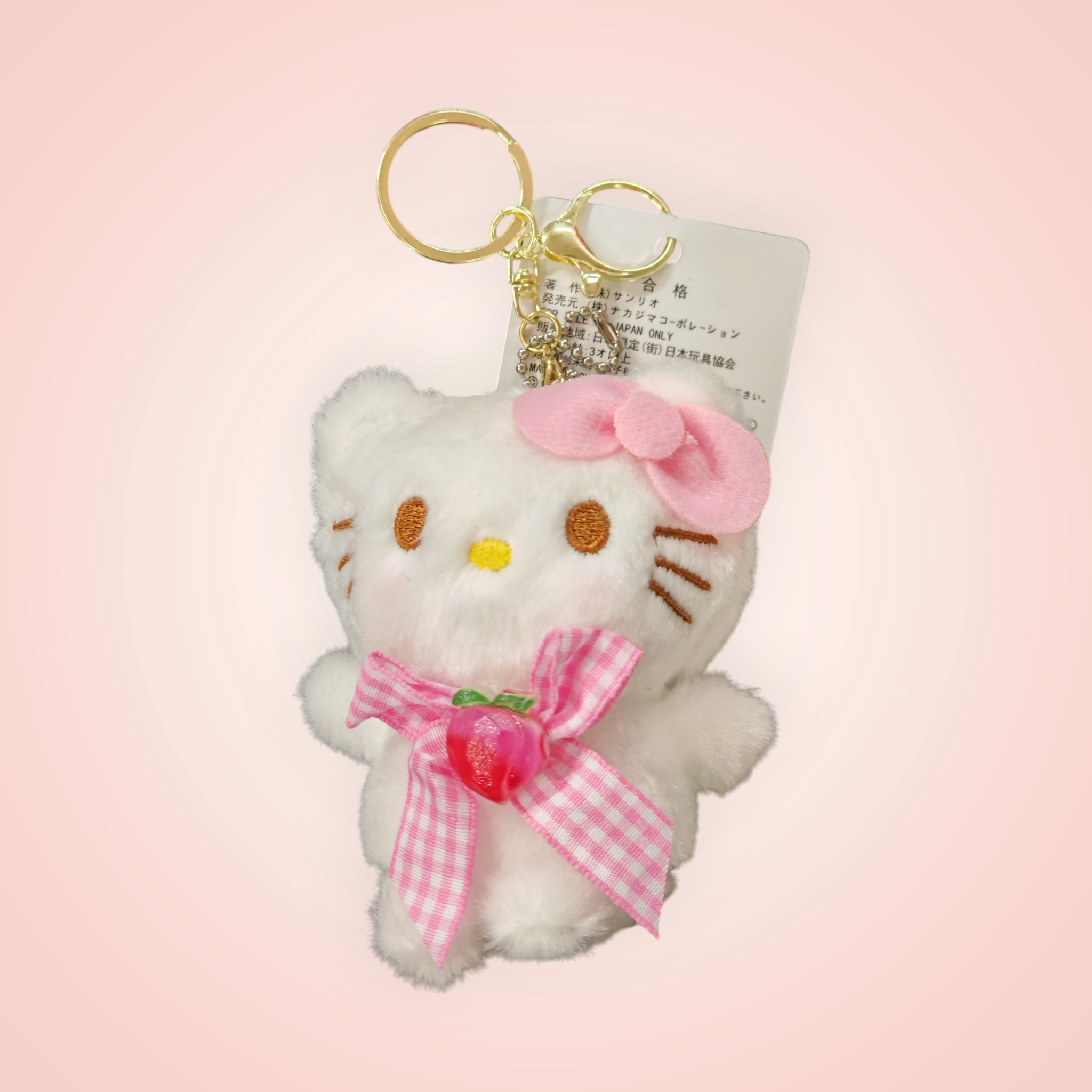 Porte-clé doudou Hello Kitty pêche