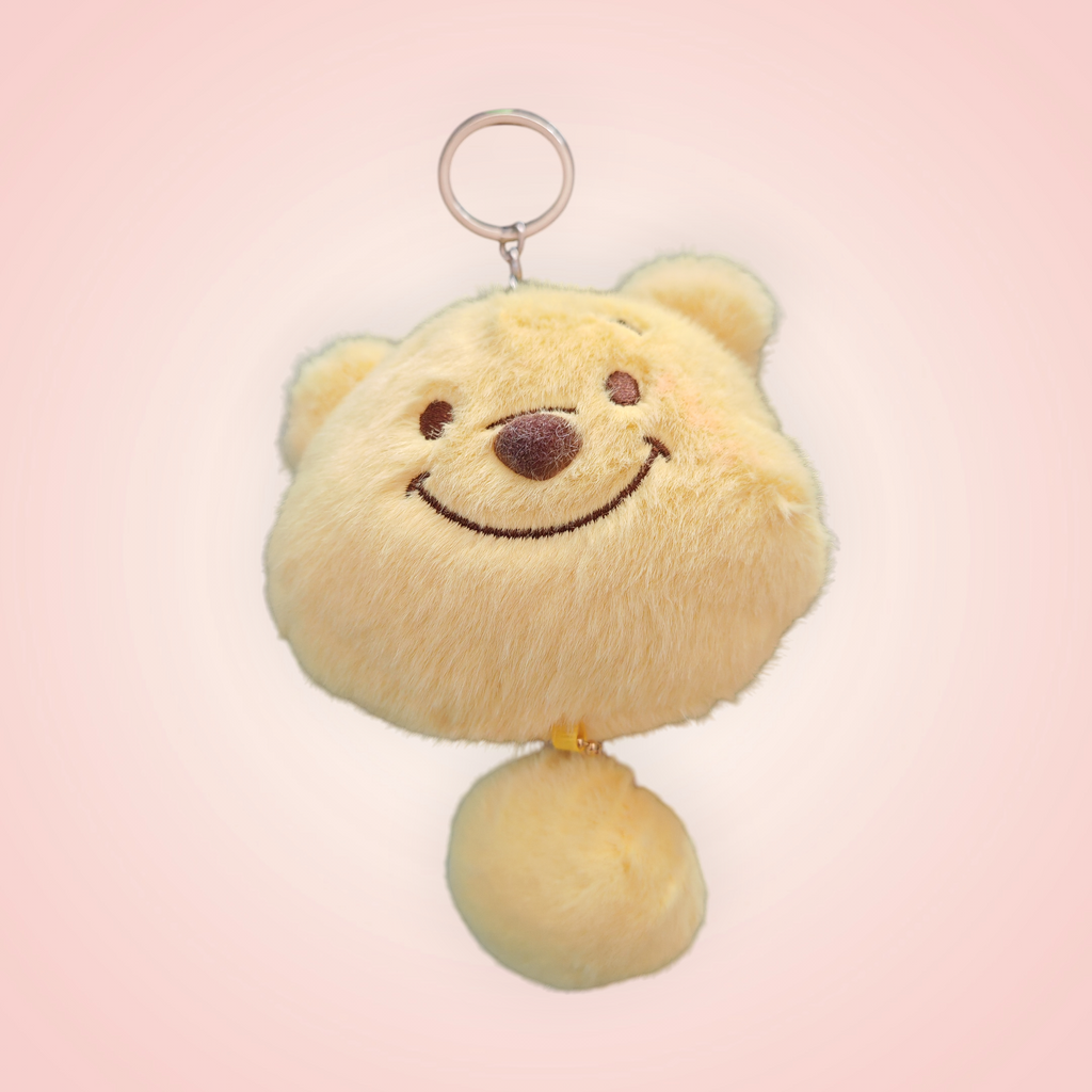 Tête doudou porte clé Winnie et ses amis