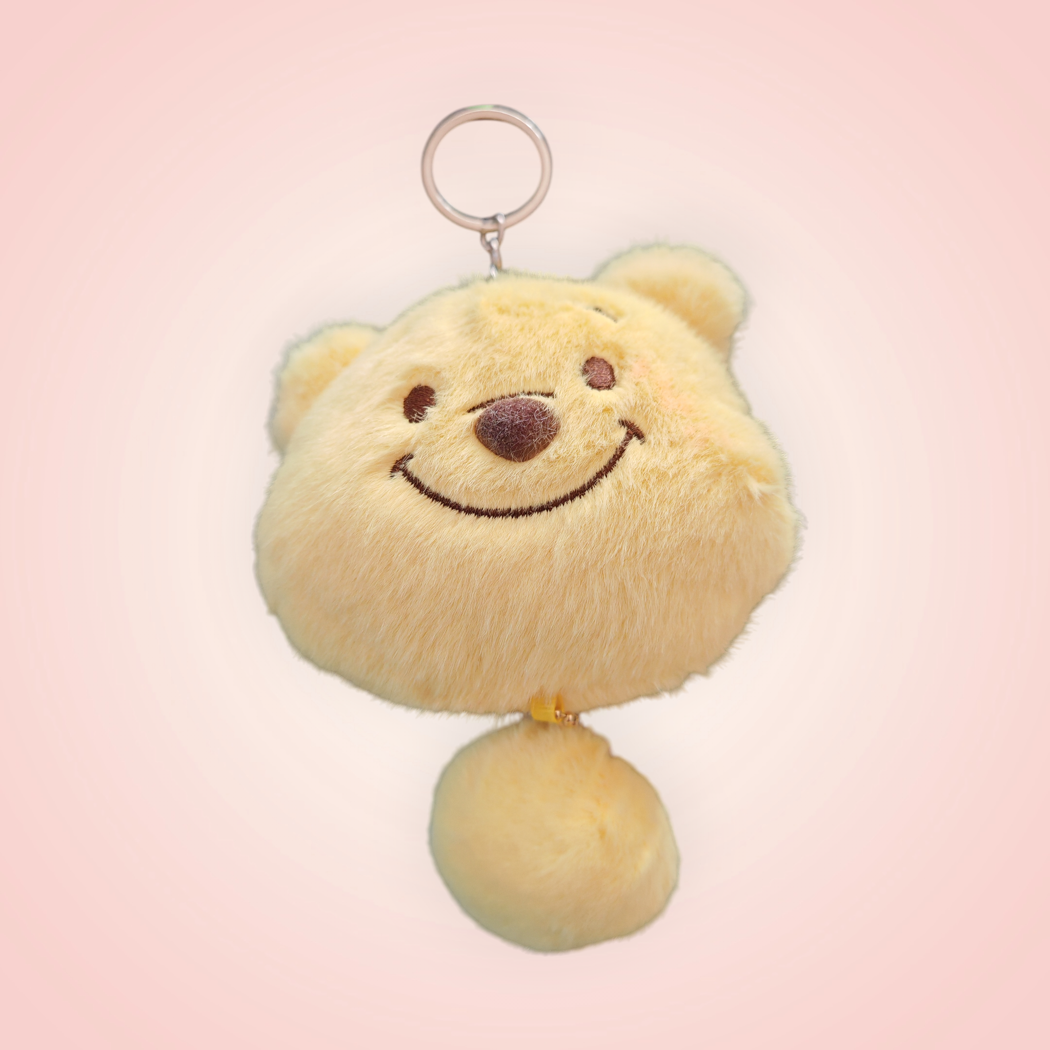 Tête doudou porte clé Winnie et ses amis